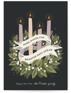 a christmas card with three candles and holly wreath on the front, which reads wish you a merry christmas