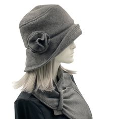 HANDMADE IN THE USA The lovely Eleanor. A super easy to wear, washable, and packable winter cloche. A practical and comfortable go-to hat for all women. Simply stylish in design and very reminiscent of those worn in the 1920s. This lovely flapper hat sits low on the head, covering the ears, and it has a wider equal width brim that can be tipped up or left down depending on how you feel. This couture hat is shown here made with warm fleece fabric. A cozy option for those chilly months to keep you Bespoke Hats, Fabric Rosette, Fleece Hats, Flapper Hat, Couture Hats, Fleece Scarf, Fleece Hat, Red Fleece, Wrap Scarf