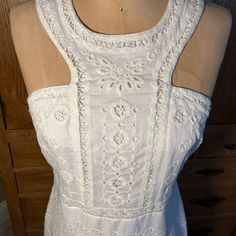 This White And Lined Detailed Embroidered Dress From Anthropologie Is New With Tags. Size 6 And Ready For A Great Day Out In The Sun. Spring Lace Dress With Cutwork, Lace Dresses With Cutwork, Sleeveless Embroidered Dress With Lace Trim For Spring, Sleeveless Lace Embroidered Dress, White Fitted Lace Embroidered Dress, White Cutwork Dress For Summer, White Embroidered Sleeveless Dress With Lace Trim, White Sleeveless Embroidered Dress With Lace Trim, Spring Fitted Dress With Cutwork