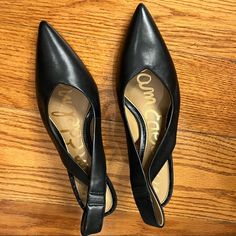 This Sleek Sam Edelman Has A Black Leather Pointy Toe Upper And Slingback Heel With A Bit Of Elastic For Easy On/Off And Sits On ~2.5 Inch Heels. Nwot, Minor Display Scuffs. Size 6.5 #Petfree #Smokefree Black Slip-on Slingback Pumps For Office, Chic Medium Width Slip-on Slingback Pumps, Black Slingback Sandals With 4-inch Heel For Work, Black Slingback Pumps With 4-inch Heel For Work, Casual Slingback Pumps With Pointed Toe, Black Leather Slingback Pumps For Work, Classic Black Slingback Sandals For Office, Casual Slingback Pumps With Pointed Toe For Evening, Black Low Heel Slingback Pumps With Heel Loop