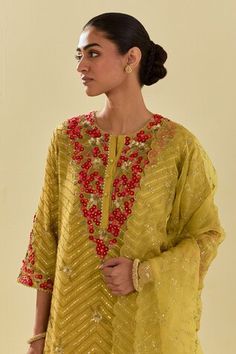 Yellow kurta featuring floral silk applique motifs and bead sequin embroidered chevron patterns. Comes with embellished pant, scalloped hem dupatta and inner slip. - Aza Fashions Yellow Dupatta, Yellow Kurta, Kurta Pant Set, Chevron Patterns, Yellow Silk, Kurta With Pants, Silk Organza, Scalloped Hem, Pant Set