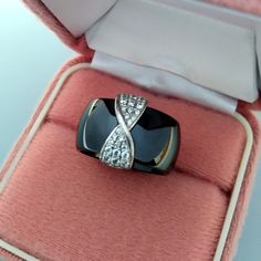 Thank you for visiting the SoChicFinds store - vintage and antique, costume and fine jewelry.  Black metal-ceramic band ring. Brand: CEB.  Metal: Sterling silver -925 silver. Gemstone: round CZ -cubic circonia. Weight of the sterling silver ring: 9.44 grams.  CZ ring is a size: diameter 17mm  ( US -6.5;  EU-53). Vintage jewelry in exellent condition. Black Ceramic Wide Band 925 Silver Ring, Sterling Silver Cubic Zirconia Ring, Vintage Metal Ceramic CZ Jewelry Black Enamel Diamond Ring For Gift, Black Enamel Diamond Ring As Gift, Gift Diamond Ring With Black Enamel, Gift Black Enamel Diamond Ring, Elegant Diamond Ring With Black Enamel For Gift, Elegant Diamond Ring With Black Enamel As Gift, Vintage Gemstone Enamel Ring As A Gift, Vintage Enamel Gemstone Ring For Gift, Elegant Diamond Enamel Ring For Gift