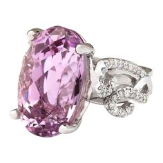 Stamped: 14K White Gold Total Ring Weight: 10.0 Grams Ring Length: N/ARing Width: N/A Gemstone Weight: Total Natural Kunzite Weight is 13.36 Carat (Measures: 17.65x10.90 mm) Color: Pink Diamond Weight: Total Natural Diamond Weight is 0.50 Carat Quantity: 54 Color: F-G, Clarity: VS2-SI1 Face Measures: 17.65x10.90 mm Sku: [703550W] Luxury White Gold Amethyst Ring With Diamond Accents, Exquisite Oval Gemstones For Formal Occasions, Exquisite Oval Gemstones For Formal Events, Luxury Diamond Ring With Gemstone Accents, Round Cut, Oval Gemstones With Diamond Accents Luxury Style, Luxury Diamond Ring With Gemstone Accents, Luxury Pink Amethyst Ring For Formal Occasions, Luxury White Gold Amethyst Ring With Gemstone Accents, Luxury Rings With Gemstone Accents For Gift