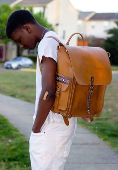 Product Details The Business vintage backpack is great for travel or work. It's a Full Grain Leather unisex Backpack. However perfect for the working girl. This stylish vintage/urban backpack is designed to be rugged with a distressed look, which an ideal size for everyday use. The leather is carefully processed to keep it natural look and quickly gets that scuffed and scraped' distressed look. Use it for school, travel, commuting, as a carry-on or just long weekend trips. Detailed Features - 10 Vintage Leather Everyday Backpack, Vintage Leather Travel Backpack, Vintage Waxed Leather Backpack For Everyday Use, Vintage Leather Backpack With Waxed Finish, Retro Rectangular Leather Backpack For Travel, Vintage Waxed Leather Satchel Backpack, Retro Rectangular Leather Travel Backpack, Vintage Leather Backpack With Waxed Finish For Everyday Use, Retro Satchel Backpack For Travel