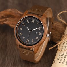 ⭐ High-Quality Casual Watch with Reasonable Price  ⭐ Genuine Leather Strap ⭐ Professional Engraving Services  ⭐ Ideal Anniversary Gift for Husband, Best Birthday Gift for Men ✅ Crafted from high-quality Natural Wood - Walnut watch with a genuine leather strap, it is healthy, lightweight, fashion design, Comfortable to wear and durable. ✅ Accurate Japanese Quartz Movement - Japanese quartz movement to guarantee accurate time, the original battery can last more than 2 years. ✅ Engraved Men's Watch - Surprise your husband, boyfriend, dad, or son with this stunning watch on many occasions, including birthday, anniversary, Father's Day, Wedding Day, Graduation, Retirement or special moments in your relationship.  ✅ Professional Engraving Service - We provide a variety of style options for engra Gift Watches With Date Display, Round Watches With Date Display As Gift, Brown Automatic Watch Ideal For Gift, Brown Chronograph Watch With Round Dial As Gift, Brown Watch Accessories With Rectangular Dial For Gifts, Brown Rectangular Dial Watch Accessories For Gifts, Brown Rectangular Dial Watch Accessories As Gift, Brown Analog Display Watch As Gift, Brown Watch With Rectangular Dial For Gift