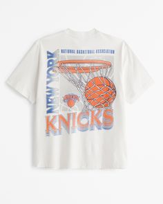 Classic short-sleeve tee in our softAF 180g fabric and vintage oversized-fit silhouette, featuring New York Knicks-inspired graphic detail at left chest and back and crew neckline. 90s Sport, Sports Style, Vintage New York, American Clothing, Men's Tops, New York Knicks, Denver Broncos, Suits Coats, Athletic Fits