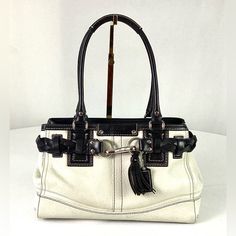 Coach Hampton-#F13804-White And Black Leather Top Handle Carryall Handles Have A 7.5 Inch Drop Silver Brass Hardware Zip Closure The Inside Has A Zip Pocket With The Coach Creed Below The Other Side Has Two Slip Pockets Approx.-12 Inches Wide 8 Inches High And 4 Inches Deep Looks Never Used Like New -No Issues White Shoulder Bag With Metal Hardware, White Satchel With Silver-tone Hardware For Errands, White Bags With Metal Hardware For Everyday Use, White Tote Shoulder Bag With Metal Hardware, White Everyday Bags With Metal Hardware, White Top Handle Shoulder Bag With Metal Hardware, White Shoulder Bag With Metal Hardware For Everyday, White Bags With Silver-tone Hardware For Everyday Use, White Satchel With Metal Hardware For Travel