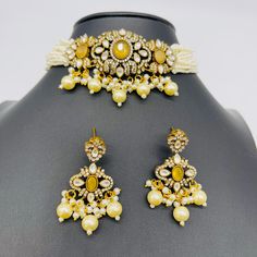 We bring beautiful Jewelry sure to elevate any look! Kindly pay attention to all photos and video and ask questions about the item prior to ordering. Elegant Yellow Choker Jewelry, Elegant Yellow Bridal Necklace For Festive Occasion, Elegant Yellow Kundan Jewelry, Elegant Yellow Choker As A Gift, Elegant Yellow Choker For Gifts, Elegant Yellow Kundan Necklace As Gift, Elegant Yellow Kundan Necklace Gift, Yellow Pearl Wedding Jewelry, Set Earrings