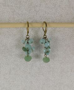 "Pretty minty green hued aventurine, moonstone, and crystal cluster earrings on leverback hooks. Aventure, moonstone and glimmer crystal mix. Earrings hang about 1-1/2\" from point of skin contact. Slight patina to the hooks and jump rings...nothing unusual for 30 years. Lovely vintage condition." Aventurine Natural Stone Dangle Jewelry, Adjustable Aventurine Dangle Jewelry, Crystal Cluster Earrings, Minty Green, Crystal Dangle Earrings, Jewelry Crystal, Cluster Earrings, Green Gemstones, Crystal Cluster