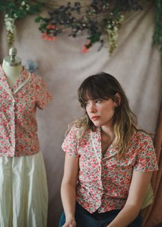 This adorable blouse is sewn from super soft, 100% cotton, that has been custom printed for Let's Backtrack! Last photo is unedited in natural light by a window. 📸 It's easily dressed up or down and ready for every occasion. Breathable, machine washable cotton makes it the perfect summer shirt. Available in sizes xs-xl This blouse is ready to ship and not customizable at this time. Feminine Cotton Blouse With Ditsy Floral Print, Ditsy Floral Print Cotton Blouse, Retro Short Sleeve Blouse, Cotton Blouse With Ditsy Floral Print, Cottagecore Cotton Blouse With Floral Print, Summer Cotton Blouse With Ditsy Floral Print, Cottagecore Floral Cotton Blouse, Cotton Ditsy Floral Print Short Sleeve Blouse, Feminine Short Sleeve Tops With Ditsy Floral Print