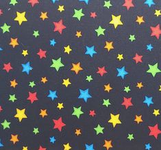 multicolored stars on black background for wallpaper