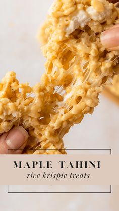 a person is holding some food in their hand with the words maple tarini rice krispies treats