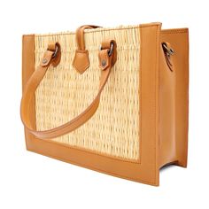 Product Description Classic but bold, this straw handbag is crafted with organic reed allied with vegetable tanning leather details, making it a timeless bag. Handmade using traditional Portuguese woven methods, by a family of master artisans, this is a masterpiece that unites old-world weaving techniques with a modern look. Designed so that you can make the most of your day-to-day life. Take it to the office or on a date and be assured that your outfit will pop from the others. Its removable sh Luxury Straw Shoulder Bag In Rectangular Shape, Luxury Rectangular Straw Shoulder Bag, Elegant Handwoven Brown Straw Bag, Natural Rattan Shoulder Bag With Woven Leather, Elegant Brown Handwoven Straw Bag, Elegant Rectangular Leather Straw Bag, Brown Rattan Straw Bag With Woven Leather, Brown Rattan Straw Bag With Woven Leather Details, Woven Leather Straw Bag With Top Handle