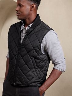 A nod to our heritage, we pulled from the Banana Republic archives to reimagine this cozy puffer with functional detail, like a classic knit bomber collar and welt pockets for your hands.  Water-Resistant.  WARMER: Fully lined and lightly insulated f Puffer Vest, Vest Dress, Welt Pocket, Banana Republic, Water Resistant, Puffer, Black