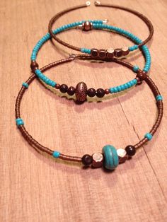 turquoise and copper bangle bracelets by RedHotYellowLeather on Etsy Beaded Bangles Bracelets, Diy Bangle Bracelets, Memory Wire Jewelry, Boho Bangle, Leather Jewelry Diy, Turquoise Bead Bracelet, Diy Jewelry Unique, Bangle Bracelet Set, Sterling Bracelets