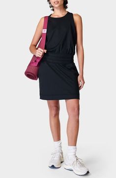 Break a sweat in this sporty dress featuring a racerback for full-range motion, a fitted waist and handy side pockets to hold your essentials. 35" length (size Medium) Slips on over head Jewel neck Racerback Front slant pockets 85% recycled polyester, 15% elastane Machine wash, line dry Imported Order Dresses Online, Europe Clothes, Black Women Dress, Yoga Dress, Victoria Secret Outfits, Sporty Dress, Black Halter Dress, Dress Order, Stretchy Dress