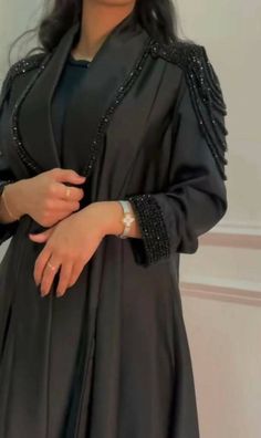 A gorgeous kimono style abaya perfect for the summer months, Ramadan, Eid, or any special occasions. Styling details include hand stitched diamonds and crystals on premium Nida fabric around the sleeves and on the lower sides of the abaya. Discreet snap fastener buttons inside the sleeve for added comfort. You are bound to receive compliments with this elegant piece. No refunds No exchanges final sale pricesCustomised productplease note that the Abaya may at times, have minimal & slight imperfec Work Abaya, Mode Abayas, Mode Kimono, Mode Abaya, Abaya Designs, Abaya Dress, Amazing Ideas, Abayas Fashion, Abaya Fashion