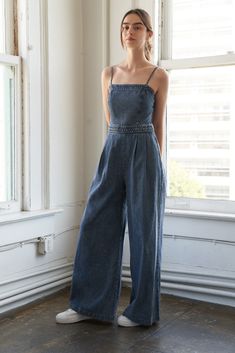 An acid washed jumpsuit featuring straight neckline, adjustable straps, braided waist band, front pleats, side pockets, wide leg and back zipper closure Details: Self : 90% Cotton 10% Polyester Size & Fit - Model is 5`9" And Wearing Size Small- Measurements Taken From Size Small- Approx. Length: 58" Chic Medium Wash Wide Leg Denim Jumpsuit, Summer Wide Leg Denim Jumpsuit, Summer Light Wash Wide Leg Denim Jumpsuit, Summer Wide Leg Medium Wash Denim Jumpsuit, Light Wash Wide Leg Denim Jumpsuit For Summer, Summer Dark Wash Wide-leg Denim Jumpsuit, Summer Wide Leg Washed Denim Jumpsuit, Summer Washed Wide-leg Denim Jumpsuit, Wide Leg Washed Denim Jumpsuit For Summer