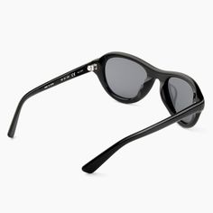 BLACK ACETATE / BLACK LENS / SILVER HARDWARE DESCRIPTION Alias is a modernized aviator with sleek refined curves reminiscent of a bygone era. The perfectly balanced style pairs teardrop lenses with a rounded acetate frame and comfortable wrap-around design perfect for showing up and showing out. Each pair is handmade in limited numbers to maintain precision and quality that will look great and last for years. We plant a tree for each pair of glasses sold on our website in partnership with Eden R Modern Acetate Cat Eye Sunglasses With Gradient Lenses, Modern Cat Eye Sunglasses With Gradient Lenses, Classic Acetate Cat Eye Sunglasses With Tinted Lenses, Modern Acetate Round Frame Sunglasses, Modern Round Frame Acetate Sunglasses, Classic Acetate Cat Eye Sunglasses With Uva Protection, Sleek Cat Eye Sunglasses With Uva Protection, Classic Glass Aviator Sunglasses With Uva Protection, Classic Aviator Sunglasses With Tinted Glass Lenses