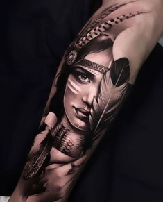 a woman with feathers on her arm