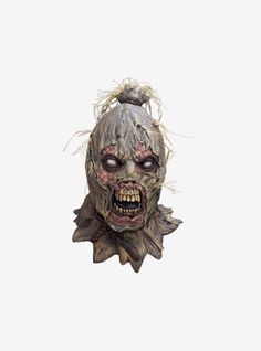 a creepy mask with hair on it's head