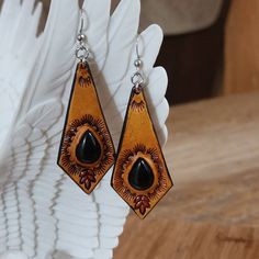 Check out this item in my Etsy shop https://www.etsy.com/listing/1448358146/handmade-tooled-leather-earrings-with Hand Tooled Leather Earrings As Gift, Hand Tooled Leather Earrings For Gift, Hand Tooled Leather Drop Earrings, Artisan Leather Nickel-free Earrings, Handmade Leather Dangle Earrings, Handmade Leather Teardrop Earrings, Leather Earrings As A Gift, Artisan Leather Earrings As Gift, Brown Leather Teardrop Jewelry