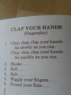 a close up of a piece of paper with writing on it that says clap your hands