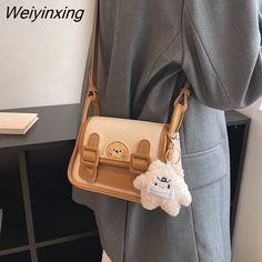 Shipping: Worldwide Express Shipping AvailableDelivery time: 🚚7-15Days Fast ShippingReturns: Fast refund,💯100% Money Back Guarantee.Brand Name: NoEnName_NullHandbags Type: Messenger BagsMain Material: PULining Material: nylonShape: Casual TotePlace Of Origin: ZHE JIANG ProvincePlace Of Origin: ZHE JIANG ProvinceOrigin: Mainland ChinaCN: ZhejiangHardness: HARDPattern Type: SolidExterior: NONEOccasion: VersatileClosure Type: zipperGender: WOMENStyle: FashionNumber of Handles/Straps: twotexture: Kawaii Beige Bags For Students, Kawaii Beige Bag For Students, Brown Rectangular Shoulder Bag For Students, Trendy Cream Bag For Students, Kawaii Beige Rectangular Shoulder Bag, Beige Portable Shoulder Bag For School, Cute Beige Shoulder Bag For School, Cute Beige School Shoulder Bag, Beige School Shoulder Bag