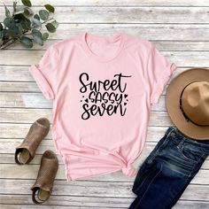 Sweet Seven Girl Shirt, 7th Birthday Girl T-Shirt, Seven Birthday Tshirt, Sweet 7th Tees, Girl Birthday Gifts, Birthday Cute Girls Outfit Hello! First of all thank you for being here and checking out our finest t-shirt designs. As Mudo Boutique, we dedicated ourselves to provide the best possible service for our valuable customers. In order to provide you best service, we are using the quality materials and beautiful designs. You can always contact us for your questions or for your suggestions. We are open for your suggestions. - Please check the size chart before you order your T-shirt. - Make sure that you have the right item on your cart. - If you want to have your order urgently, please contact us and we will do our best to ship your order faster. - In order to use your T-shirts in lon Trendy Pink T-shirt For Birthday, Sweet Graphic Print Birthday T-shirt, Sweet Pink T-shirt For Birthday, Sweet Graphic Print T-shirt For Birthday, Sweet Pink Tops With Letter Print, Sweet Letter Print T-shirt For Birthday, Cute Slogan T-shirt For Birthday, Sweet T-shirt For Summer Birthday, Sweet Summer Birthday T-shirt