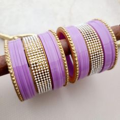 Neelam Indian , South Asian , Pakistani , Desi , Punjabi , Tamil , Indian Jewelry Purple Round Beads Jewelry For Festive Occasion, Elegant Purple Wedding Bracelets, Elegant Purple Bracelets For Wedding, Purple Beaded Jewelry For Festive Occasions, Elegant Bangle For Festive Party, Purple Beaded Bracelets For Wedding, Elegant Festive Bangle For Party, Purple Bangle For Wedding, Purple Bangle Jewelry For Wedding