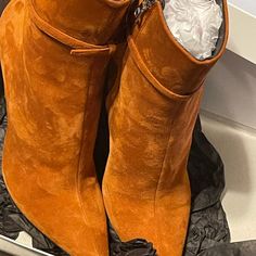 Gorgeous Burnt Orange Suede Ankle Boots. Worn Once In Perfect Condition. 5inch Heel And Rubber Sole. Also Has An Ankle Strap To Adjust The Width Around The Ankle. Please See Photos. Chic Suede Ankle Strap Boots, Narciso Rodriguez, Suede Ankle Boots, Burnt Orange, Color Orange, Ankle Strap, Bootie Boots, Rubber Sole, Ankle Boots