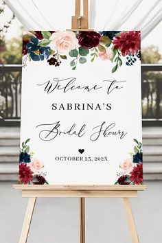 an easel with a sign that says welcome to sabrina's bride