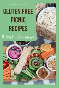 a wooden cutting board topped with different types of food and the words gluten free picnic