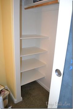 the closet is empty and ready to be put into use as a bookcase or storage unit