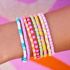 Our style motto? The bolder the better—as proven by our Vacation Vibes Stretch Bracelet Set of 8. Featuring 8 individual slip-on stretch styles in vibrant summer-fun shades, this set can be warn all together, mix and matched for your favorite combinations or shared with your friends. Each bracelet is handmade, waterproof and totally unique! WaterproofGo surf, snowboard, or even take a shower with them on. Easy On and Off One size fits most, easy to slip on and off. Set includes 8 bracelets- Tota Beachy Accessories, Bracelet Business, Bracelets Trendy, Accessories Beach, Preppy Bracelets, Beachy Style, Bracelet Pack, Bracelet Sets, Pura Vida Bracelets