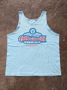 "Vintage 80's Crystal Beach Park Canada Tank Top T-shirt. Has fading, spots, discoloring, cracks in print and other wear. NO holes. In good vintage condition... Ready To Wear!! Size tag is missing. Measures to be a Med. PLEASE check measurements. Pit to Pit: 21 1/4\" Collar to Bottom: 22 1/2\"" Vintage Graphic Print Tank Top For Summer, Retro Screen Print Tank Top For Summer, Vintage Graphic Print Summer Tank Top, Vintage Crew Neck Tank Top For Summer, Vintage Acid Wash Tops For Summer, Vintage Beach Season Tops With Letter Print, Vintage Screen Print Tank Top For Summer, Vintage Letter Print Top For Beach Season, Vintage Letter Print Tops For Beach Season