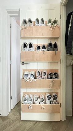 there are many pairs of shoes on the shelves