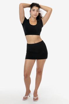 The Garment Dye Mini Tube Skort is made of our premium heavyweight cotton spandex and features a low to mid-rise fit. This skort is fitted through the hips, but not too tight around the base for ease of movement. This style features a full coverage brief and a hidden 1” elastic waistband for comfortable, stress-free wear. The inside briefs have a flattering, high cut leg opening and help maintain the lower rise of the skirt so it doesn't shift or rise up as you wear it. Try pairing this skort wi Fitted Cotton Yoga Shorts, Stretch Cotton Mini Skirt With Built-in Shorts, Cotton Stretch Skort, Fitted Short Elastane Mini Skirt, Fitted Cotton Mini Crop Top, High Stretch Cotton Bottoms With Built-in Shorts, Stretch Cotton Mini Skirt, Fitted Cotton Mini Skirt With Built-in Shorts, Stretch Crop Top With Built-in Shorts