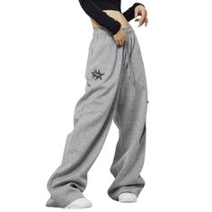 Indulge in luxurious comfort with our Women's Star Patch Sweatpants. Made from premium materials, these sweatpants feature a unique star patch design for added style. Perfect for lounging or running errands, these sweatpants are a must-have for any fashion-forward woman. Elevate your wardrobe and make a statement with our Women's Star Patch Sweatpants. Features: -55% Polyester,45% Acrylic -Adjustable Waistband -Straight Leg -Star Print -MId-rise waist -Regular fit -Classic style Streetwear Wide Leg Bottoms With Star Print, Wide Leg Bottoms With Star Print For Streetwear, Star Print Wide Leg Bottoms For Streetwear, Wide Leg Star Print Bottoms For Streetwear, Cotton Bottoms With Star Print For Streetwear, Cotton Star Print Pants For Streetwear, Baggy Hip Hop Sweatpants For Loungewear, Casual Star Print Bottoms For Fall, Casual Star Print Bottoms For Streetwear