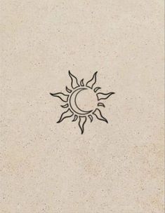 the sun and moon are drawn in black ink on a beige paper background, which is slightly shabby