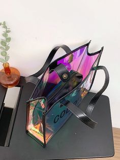 Bag For Love - Clear Holographic Shoulder Tote Bag - Women Tote Bags Product Description Color Multicolor Quantity 1 piece Type Shoulder Tote Bag Material PVC Composition 100% Polyvinyl Chloride Size Chart INCH CM Size Bag Width Bag Height Bag Length one-size 1.6/3.5 7.9/11 7.9/13 Size Bag Width Bag Height Bag Length one-size 4/9 20/28 20/33 Similar Products h2 { text-align: center; } .red-box { width: 100%; display: flex; flex-direction: row; flex-wrap: wrap; justify-content: center; } .red-box Black Rectangular Shoulder Bag With Letter Print, Rectangular Black Shoulder Bag With Letter Print, Black Rectangular Bag With Letter Print, Trendy Square Bag With Letter Print, Square Shoulder Bag With Letter Print For Shopping, Rectangular Letter Print Bags For Shopping, Rectangular Shoulder Bag With Letter Print For Shopping, Trendy Rectangular Bag With Letter Print, Rectangular Letter Print Shoulder Bag For Shopping