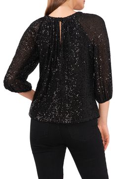 Glittery allover sequins enliven this night-out top designed with three-quarter sleeves and airy keyhole necklines. 24" length (size Medium) Jewel neck Three-quarter sleeves Partially lined 100% polyester Machine wash, line dry Imported Vegas Outfits For Women, Vegas Outfits, Outfits For Women Over 50, Elegant Tops, Night Out Tops, Keyhole Blouse, Sequin Blouse, Keyhole Top, Keyhole Neck