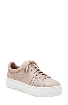 Breathable perforations and a low-profile silhouette lend street-savvy appeal to a leather sneaker grounded by a chunky platform and slip-resistant sole. 1 1/2" platform (size 11) Lace-up style Cushioned footbed Slip-resistant sole Leather upper/synthetic lining/rubber sole Imported Spring Wedge Sneakers With Perforated Toe Box, Spring Low-top Platform Sneakers With Speckled Midsole, Spring Leather Wedge Sneakers For Streetwear, Spring Leather Platform Sneakers For Streetwear, Spring Streetwear Leather Wedge Sneakers, Spring Leather Slip-on Platform Sneakers, Leather Low-top Platform Wedge Sneakers, Trendy Lace-up Platform Sneakers With Perforations, Casual Low-top Wedge Sneakers With Perforated Toe Box