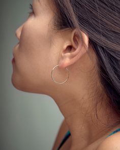 "These gold hoop earrings are the perfect addition to your minimalist earring collection. Our gold fill hoops are meant to be classic enough for everyday wear or to give as a bridesmaid gift. These trendy earrings will definitely be a favorite of yours! SOLD AS A PAIR ** PLEASE NOTE: The model is wearing multiple earrings. This listing is for a pair of Gold Hoop earrings only ** At LunaiJewelry, we take pride in the details and love we pour into everything we make. We know you'll find something Nickel Free Circular Earrings, Hoop Wrap Earrings For Gift, Hypoallergenic Hoop Earrings For Weddings, Small Hoop Hypoallergenic Earrings For Wedding, Hypoallergenic Small Hoop Earrings For Wedding, Small Hoop Nickel Free Earrings For Wedding, Small Hoop Earrings For Wedding, Nickel Free, Small Hoop Nickel-free Earrings For Wedding, Small Nickel-free Hoop Earrings For Wedding