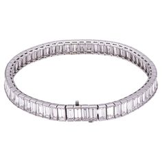 Tiffany & Co. Channel Set Tennis Bracelet with Baguette Stones In Platinum 950 set with Baguette Diamonds D/E/F color & VVS clarity Exceptional piece of jewelry, very rare Tiffany piece Total carat weight is 19.52ct length 7'' Comes is a original Tiffany Box Tennis Bracelet Diamond Tiffany, Baguette Jewelry, Tiffany And Co Bracelet, Tiffany Box, Desired Reality, Bracelet Diamond, Baguette Ring, Baguette Diamonds, Tiffany And Co