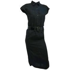 1980s Claude Montana Black Linen Shirtwaist Dress. Snap buttons at front, shirt collar, one front breast pocket. Wide patent leather belt. Dramatic pleated kick pleat. Classic Belted Shirt Dress For Semi-formal Occasions, Fitted Collared Belted Dress For Semi-formal, Fitted Collared Semi-formal Belted Dress, Classic Belted Collared Dress, Classic Fitted Collared Belted Dress, Fitted Collared Belted Dress For Work, Classic Collared Shirt Dress For Business, Classic Fitted Belted Dress For Daywear, Classic Collared Belted Dress For Formal Occasions