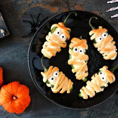 halloween treats are arranged in the shape of caterpillars