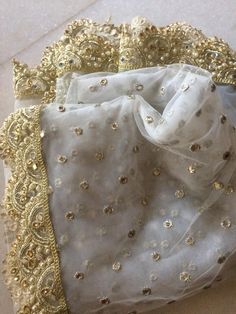 More dupatta here in our collection https://www.etsy.com/shop/neelcreations/?section_id=15880219 White with embroidery Indian dupatta. It has beautiful golden border. Scallop border with dull gold color. ★ The mirror is not real. ★ It can be made in other colors and longer in length also. We can also change the border if you want. Approximate length 88-90 inches. We can increase length so please contact us if you want longer dupatta. These designer dupattas are very much in trend. Pair them with Wedding Head Wrap, Duppattas Designs Ideas, Wedding Dupatta, Lehenga Dupatta, Bridal Dupatta, Girls Party Wear, Lehenga Suit, Zari Embroidery, White Indian Wedding