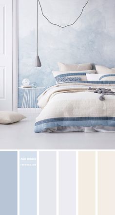 a bedroom with blue, white and grey colors