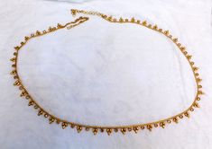 * Beautifully designed gold color belly chain. * can be used with belly dance costumes and saris. * Adjustable from 25 to 41 inches waist. * D.no.1 * D.no.2 *D.no.3 *D.no.4 Bohemian Gold Waist Chain For Festivals, Traditional Gold Bridal Belt For Festivals, Bollywood Gold Bridal Belt For Festivals, Gold Bollywood Bridal Belt For Party, Gold Bridal Belt For Diwali Ceremonial, Gold Beads Choker For Festival, Gold Bollywood Waist Chain For Wedding, Gold Bohemian Choker With Tilla Detail, Bollywood Gold Waist Chain For Weddings